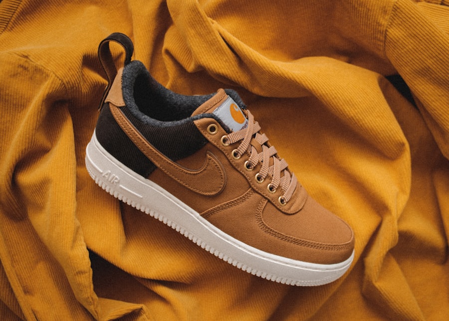 Tan Nike low-top trainers checked for condition and crop