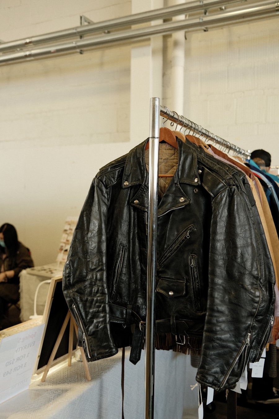Dark cropped black jacket photo before ListBoost improvement